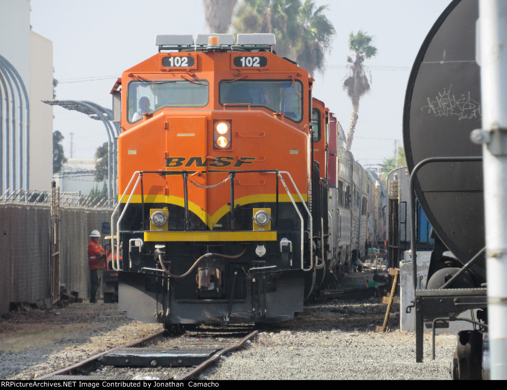 BNSF 102 shoves in a line of private passenger cars into Monad yard